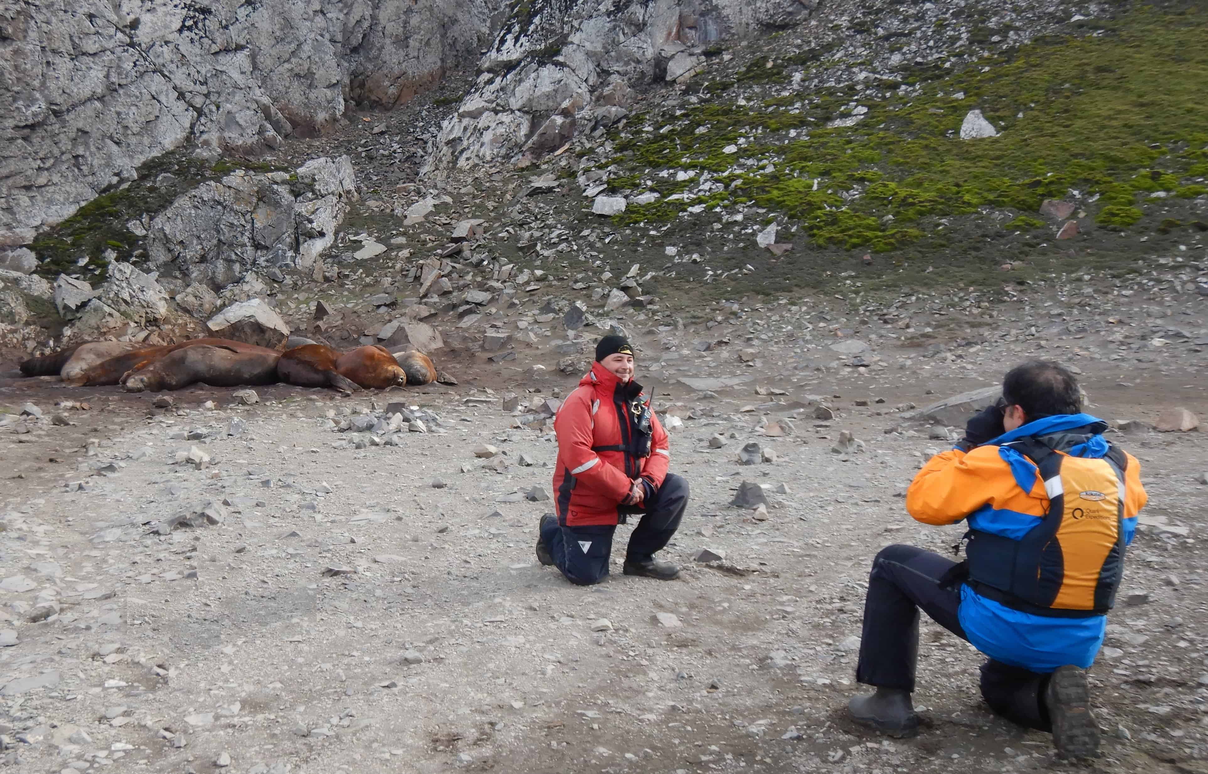 Dr. Jeet taking a picture of Miko and the Elephant Seals for a new photo on the Quark Expeditions website.